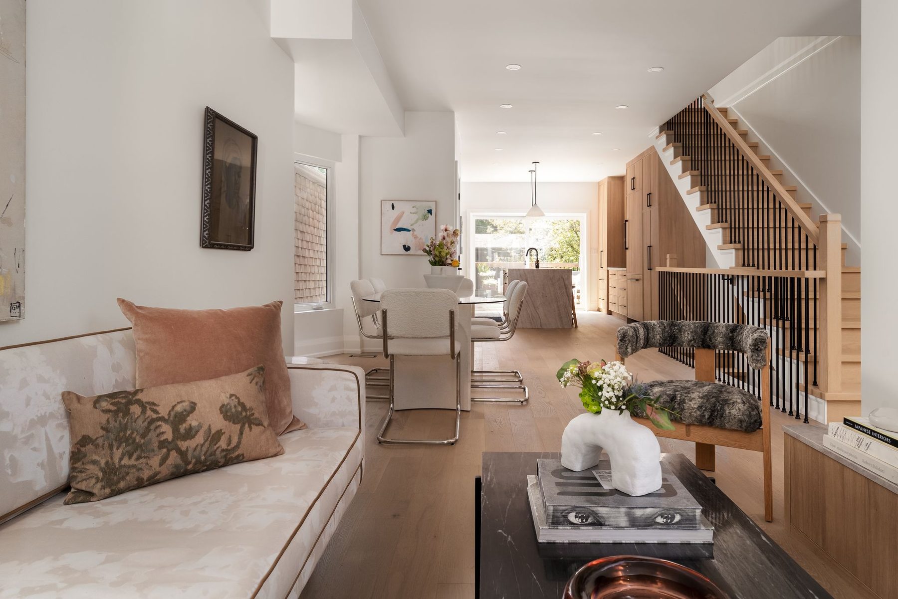 Open living room and custom millwork after a full home renovation in Toronto